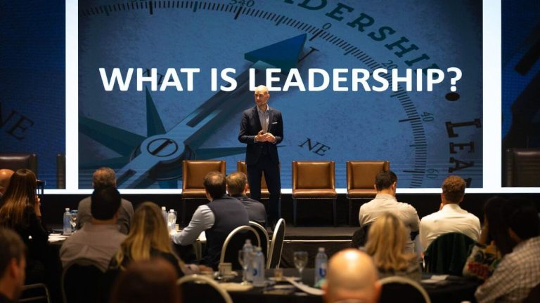 Duncan Stevens delivering a keynote on leadership and influence at a corporate conference in Hamburg 2026.